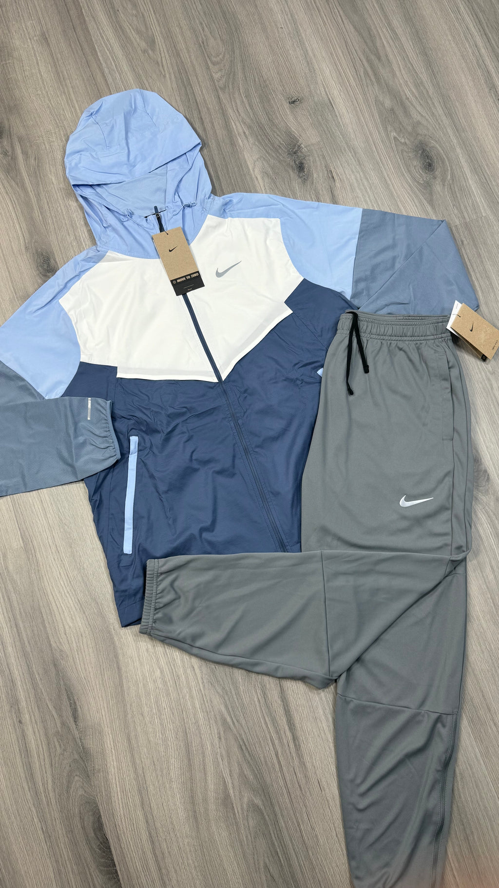 Nike Windbreaker Light blue and white with grey challenger bottoms