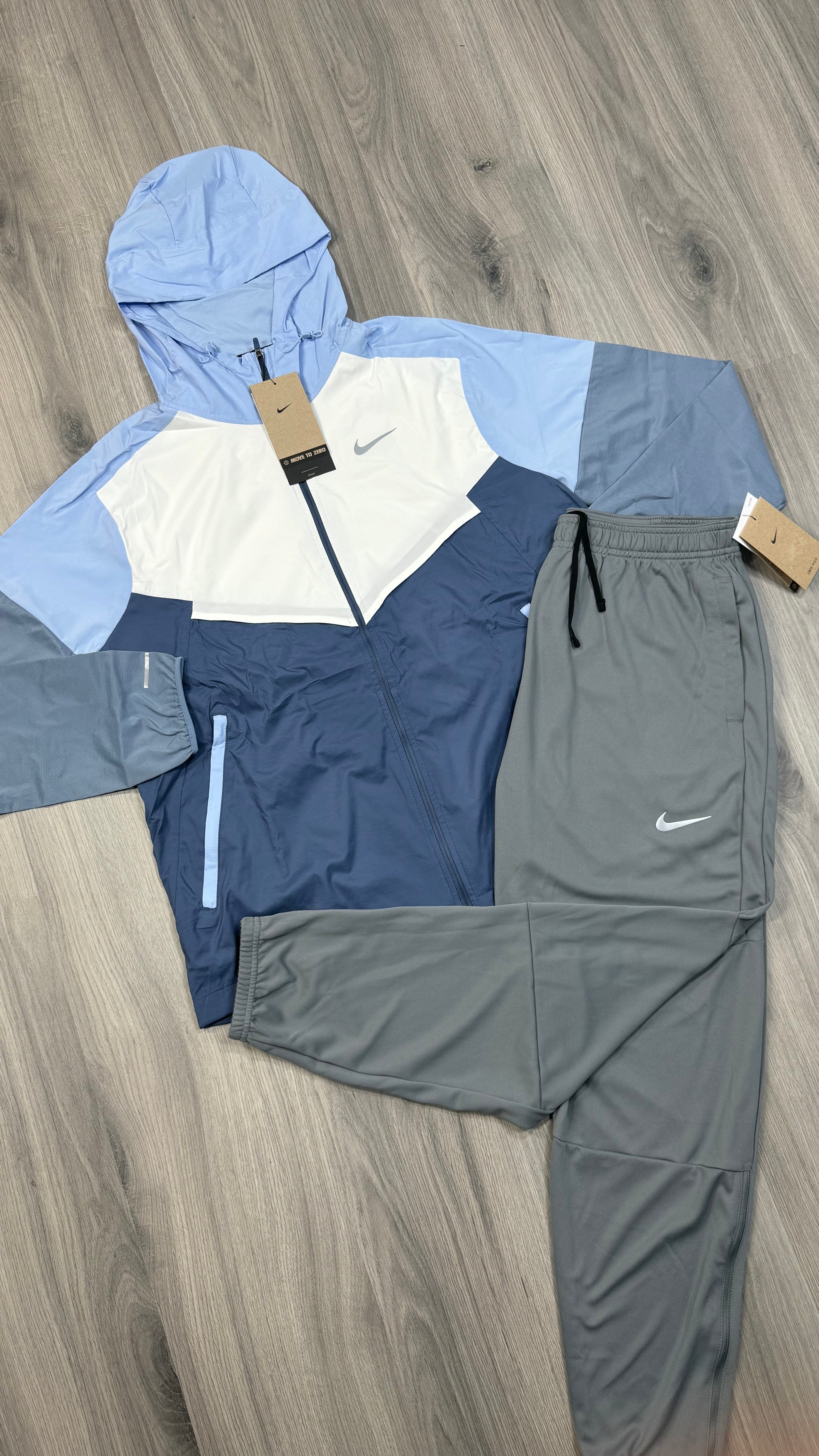Nike Windbreaker Light blue and white with grey challenger bottoms
