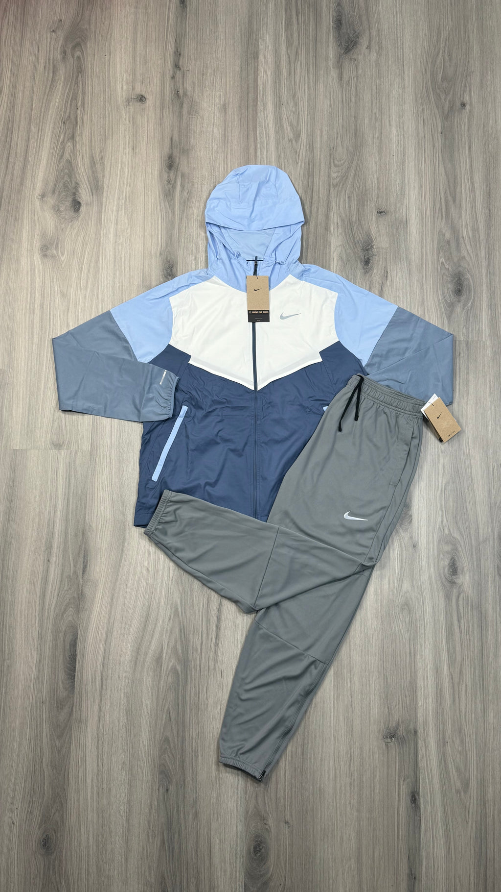 Nike Windbreaker Light blue and white with grey challenger bottoms