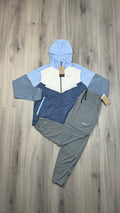 Nike Windbreaker Light blue and white with grey challenger bottoms