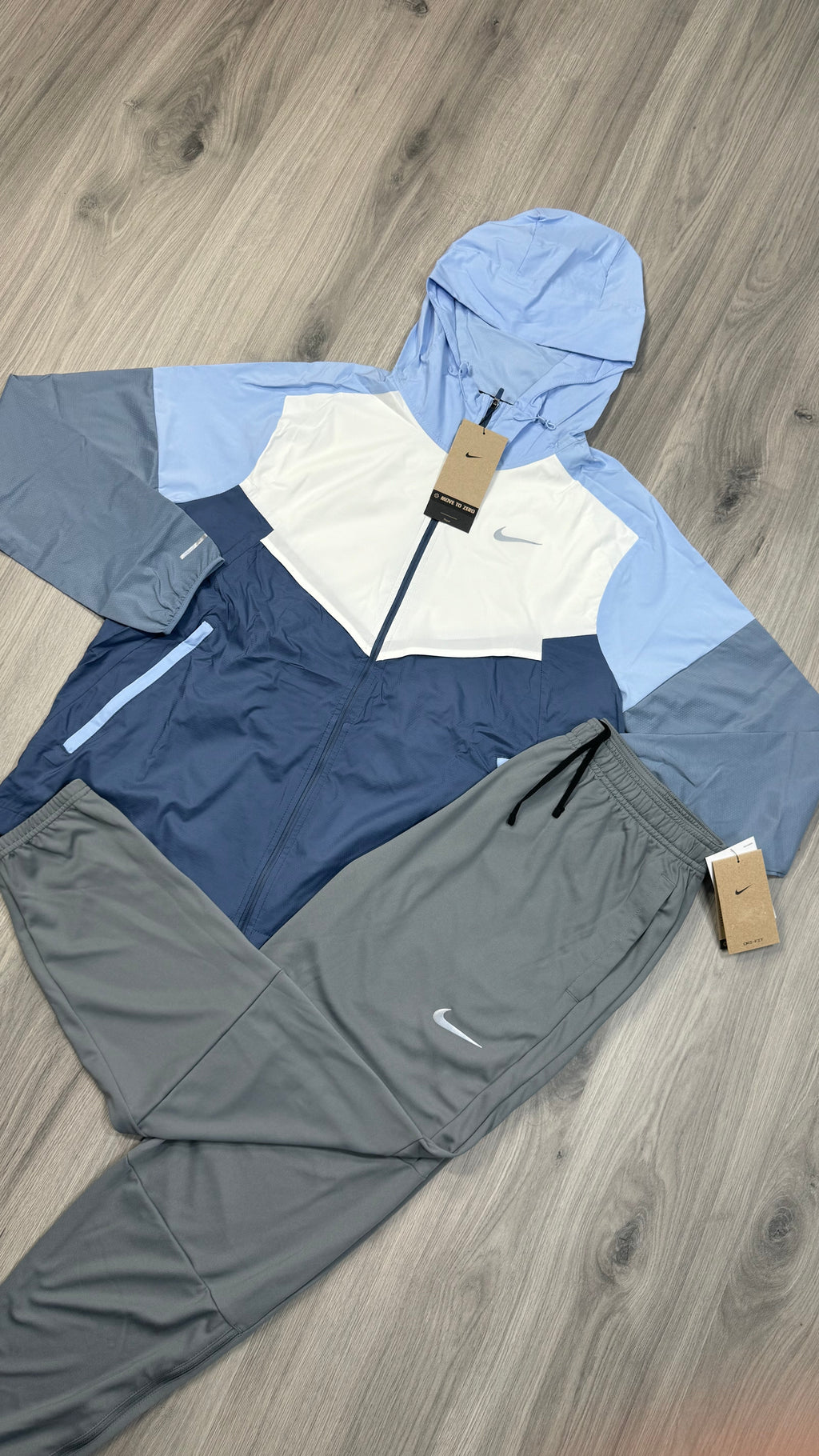 Nike Windbreaker Light blue and white with grey challenger bottoms