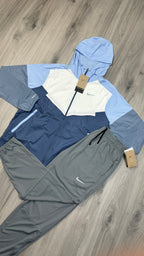 Nike Windbreaker Light blue and white with grey challenger bottoms