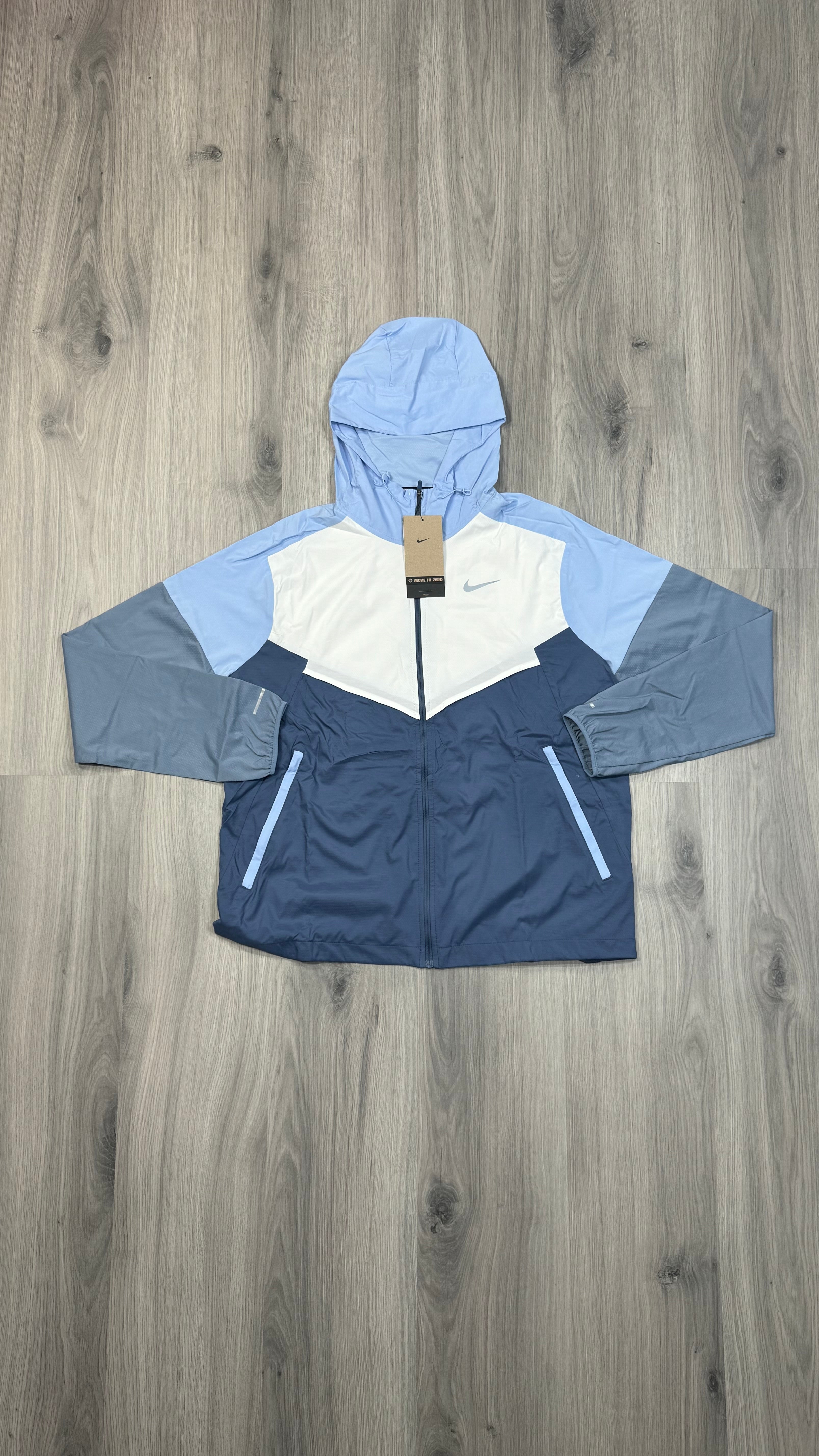 Nike Windbreaker Light blue and white with grey challenger bottoms